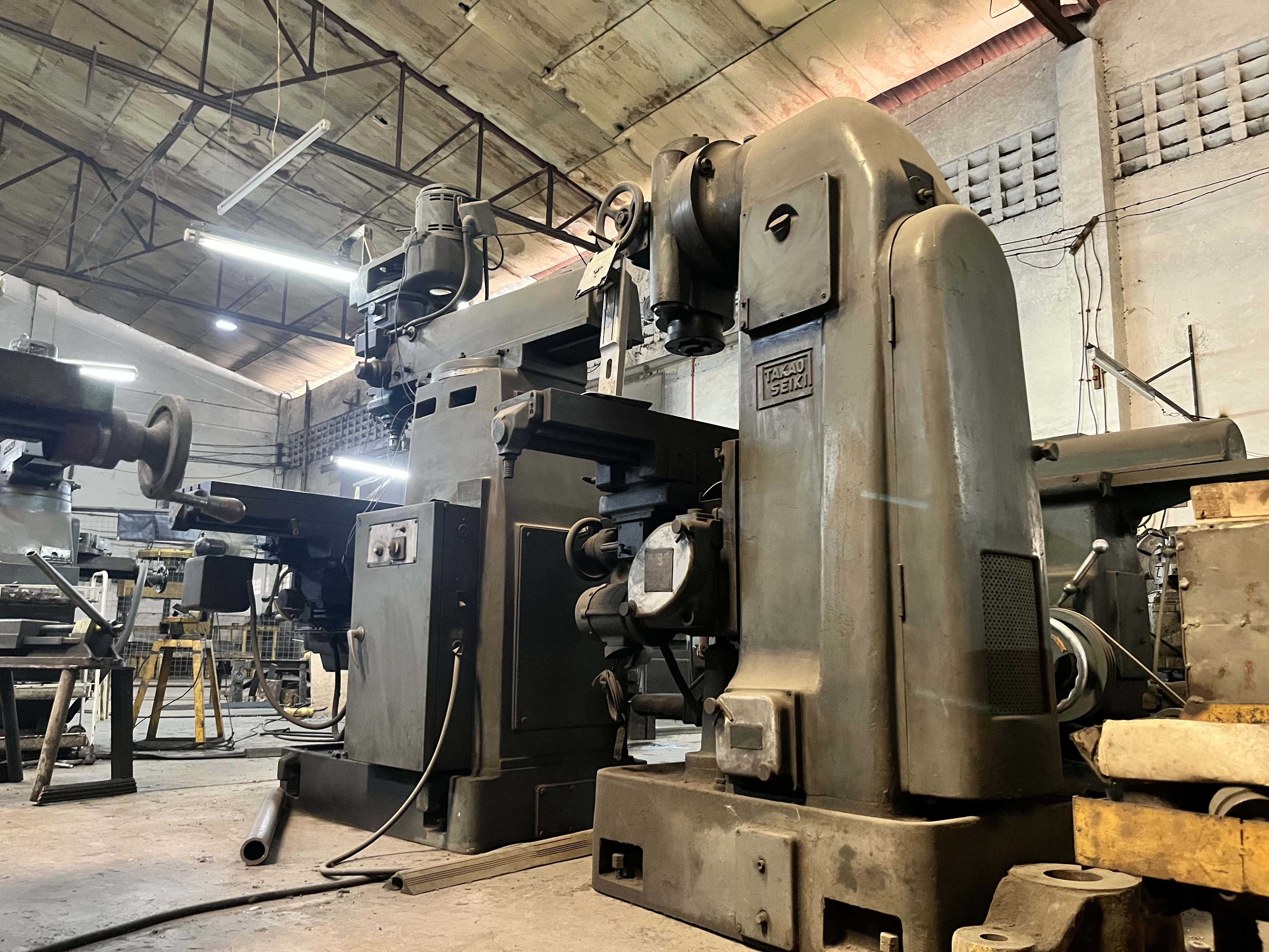 Takau Seiki industrial rubber machinery and precision manufacturing equipment